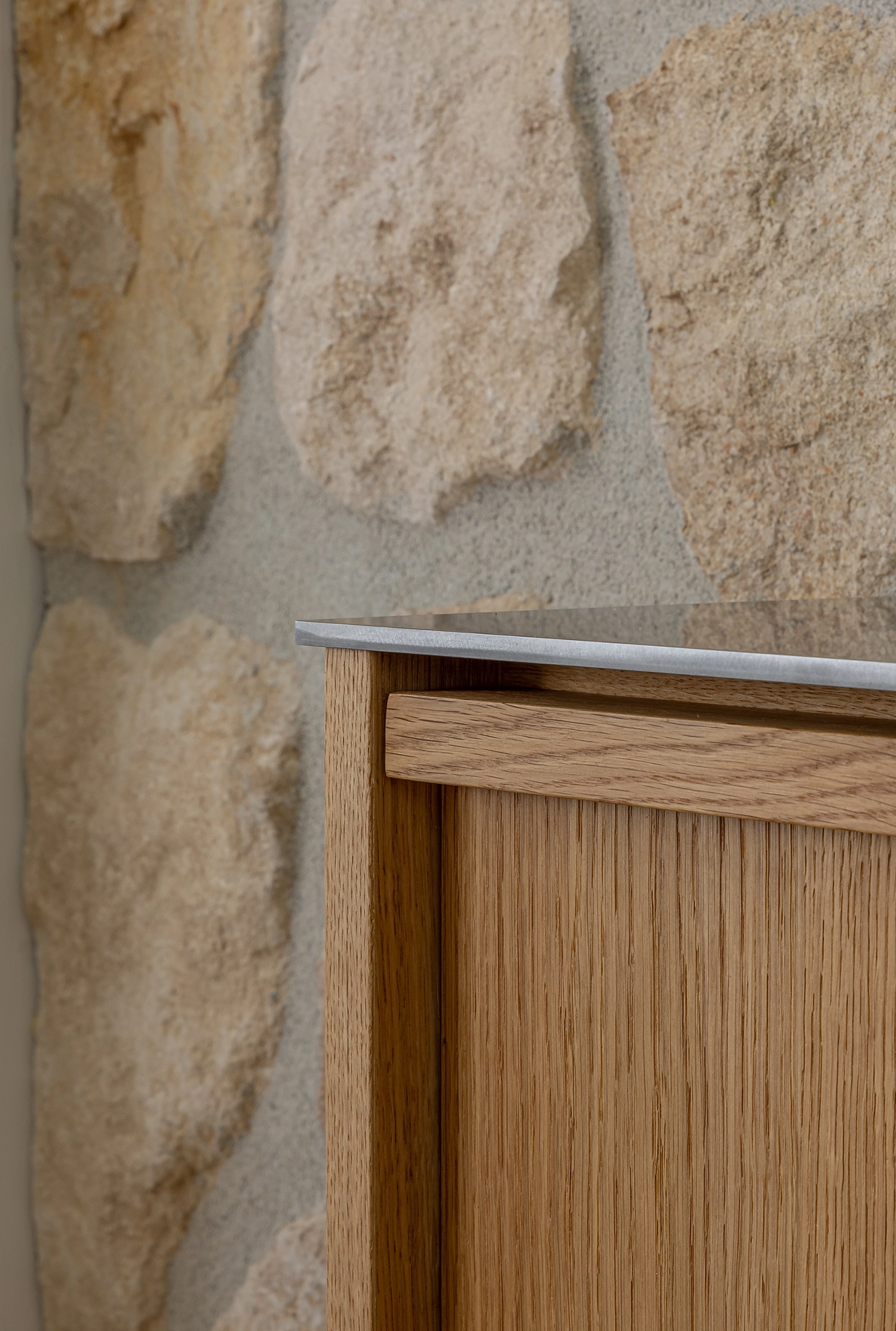 Kitchen with layered textures and subtle Spanish influence
