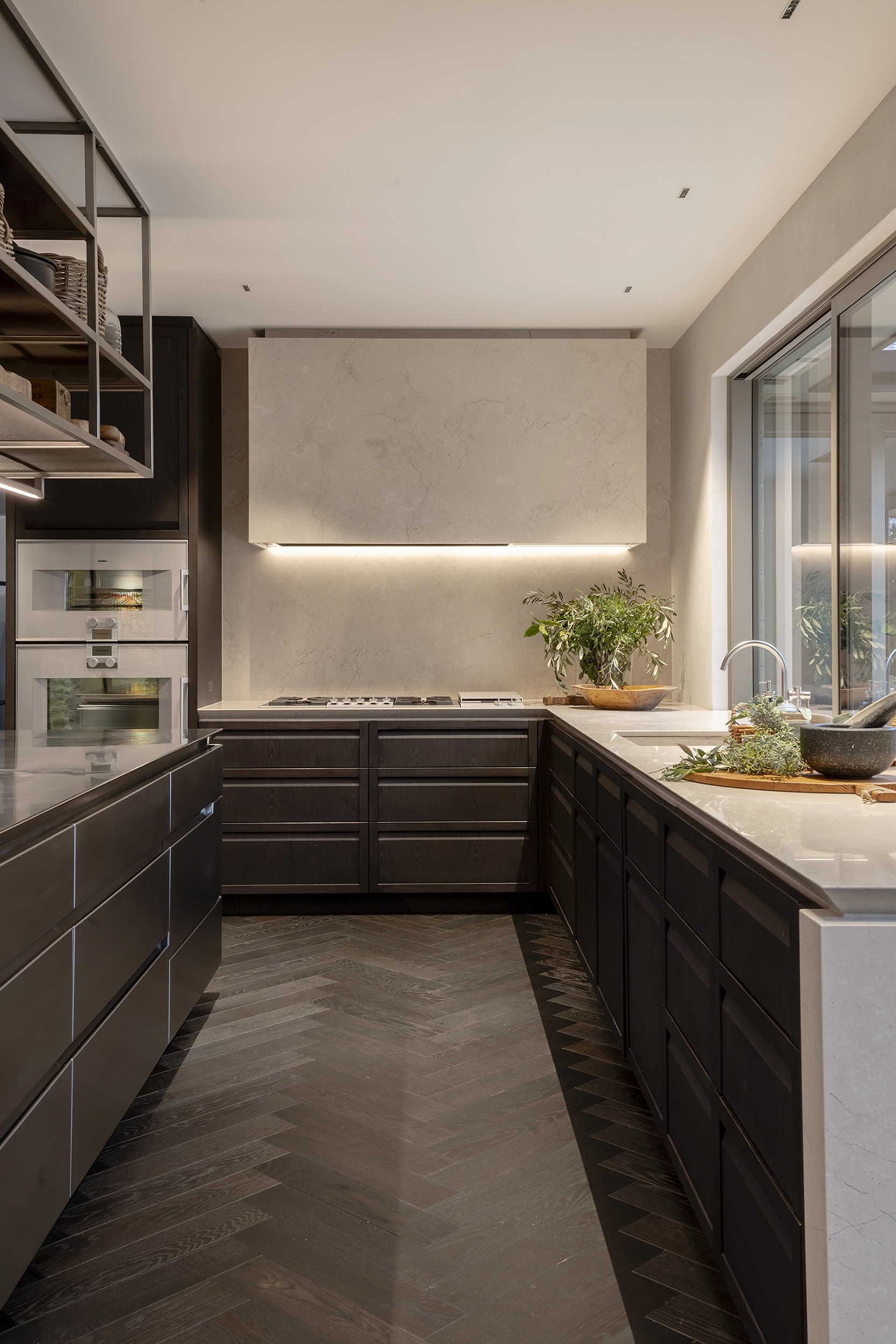 Kitchen with earthy palette and engineered timber flooring