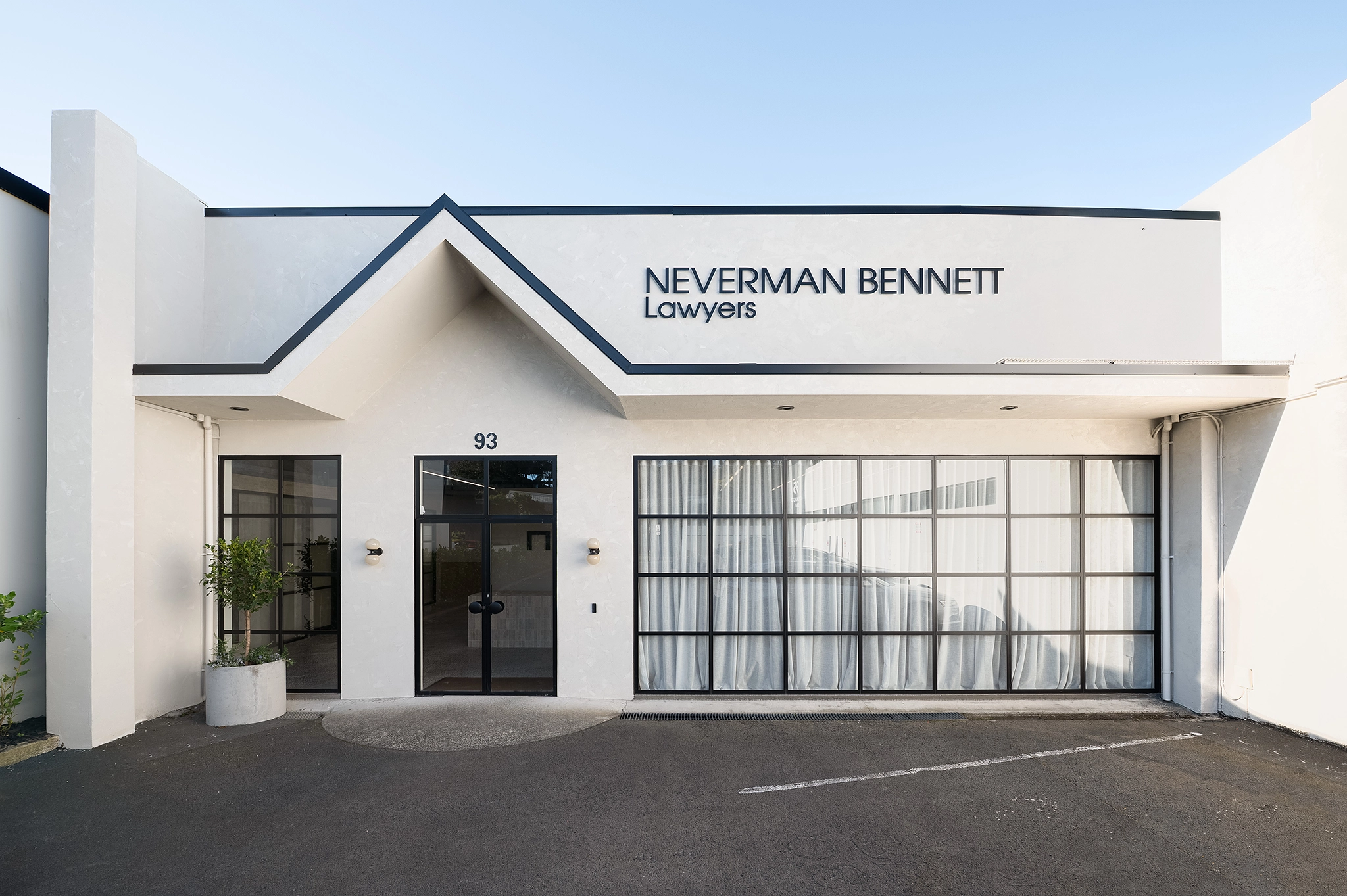 Hamilton law office kitchen with warm walnut veneer