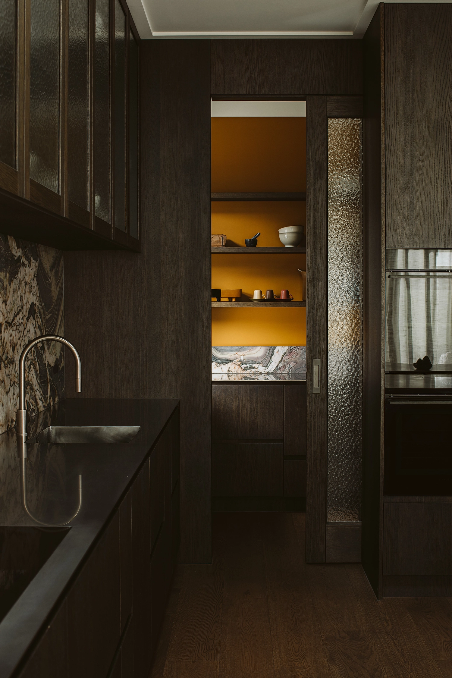 Custom kitchen in dark European oak timber