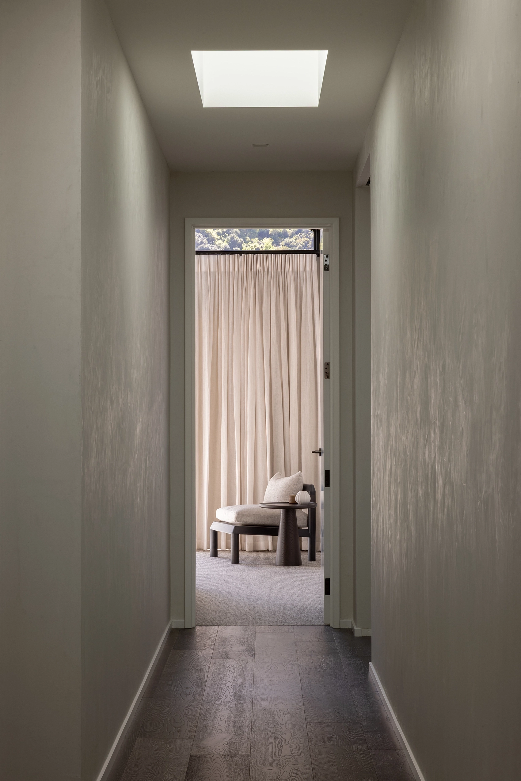 Timber flooring complementing schist and natural materials