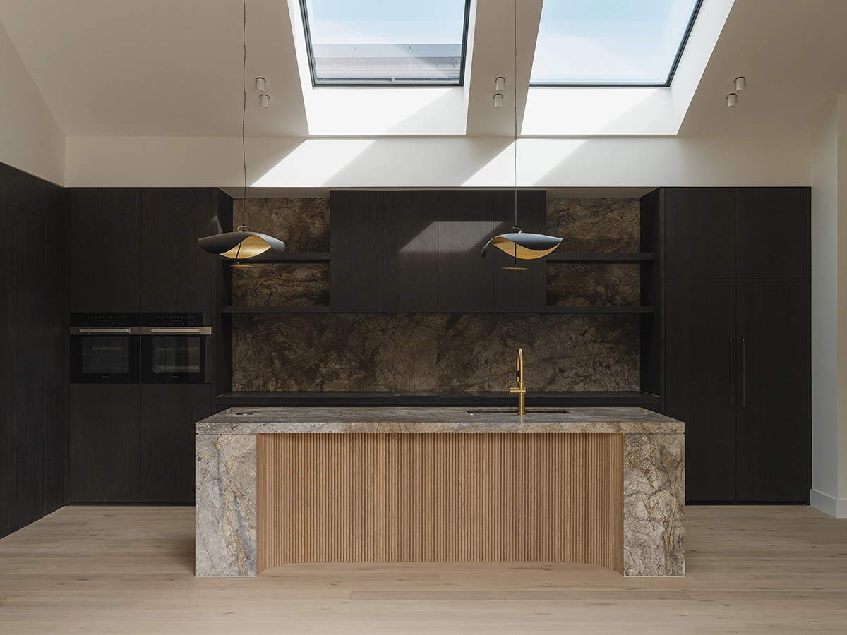 TRUNK Elza timber flooring NZ in a warm-toned Auckland home by Z Architecture, pale wood against dark cabinetry