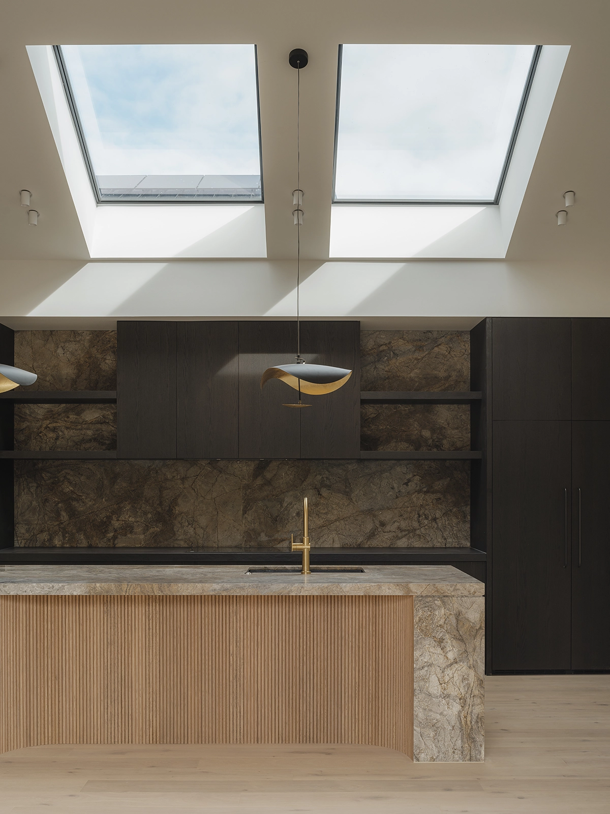 TRUNK Elza timber flooring NZ under skylights drawing natural light into an open-plan Auckland home