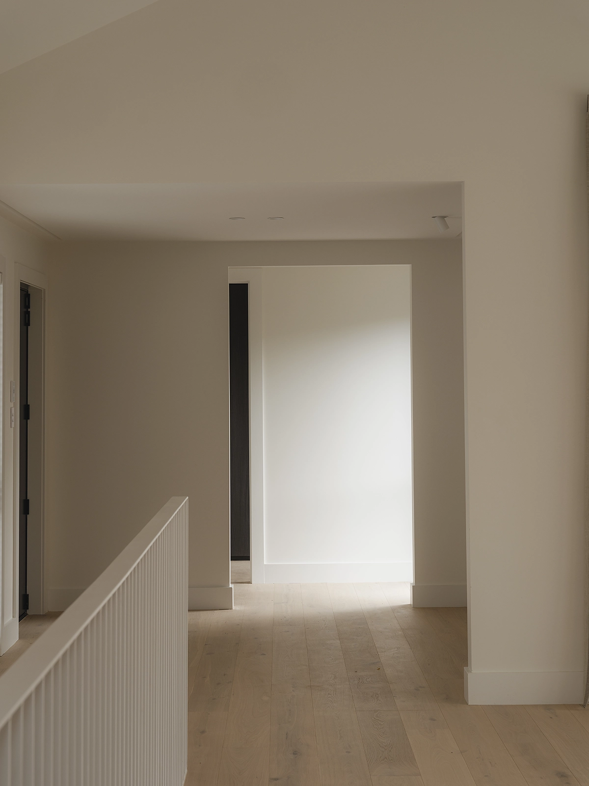 TRUNK Elza timber flooring NZ in a hallway running continuously from entry to living, Auckland NZ