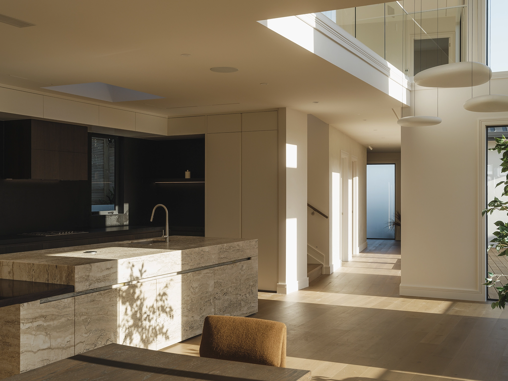 Smoked timber flooring NZ in the living area of a new-build Auckland family home, Codrington Residence