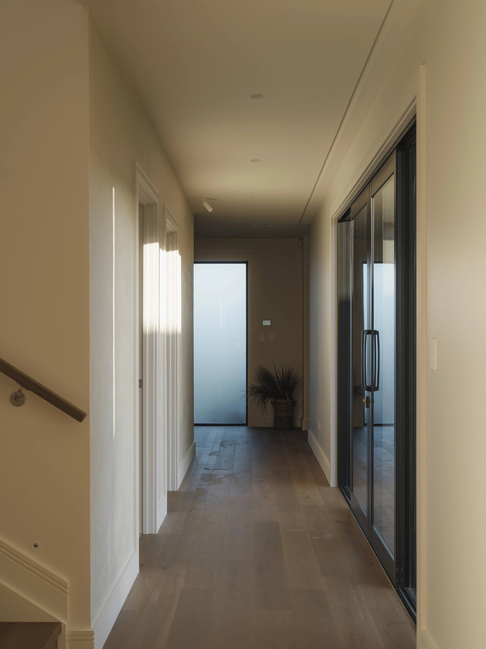 TRUNK Vetra smoked timber flooring NZ in a new-build Auckland family home by VidaSpace, Codrington Residence