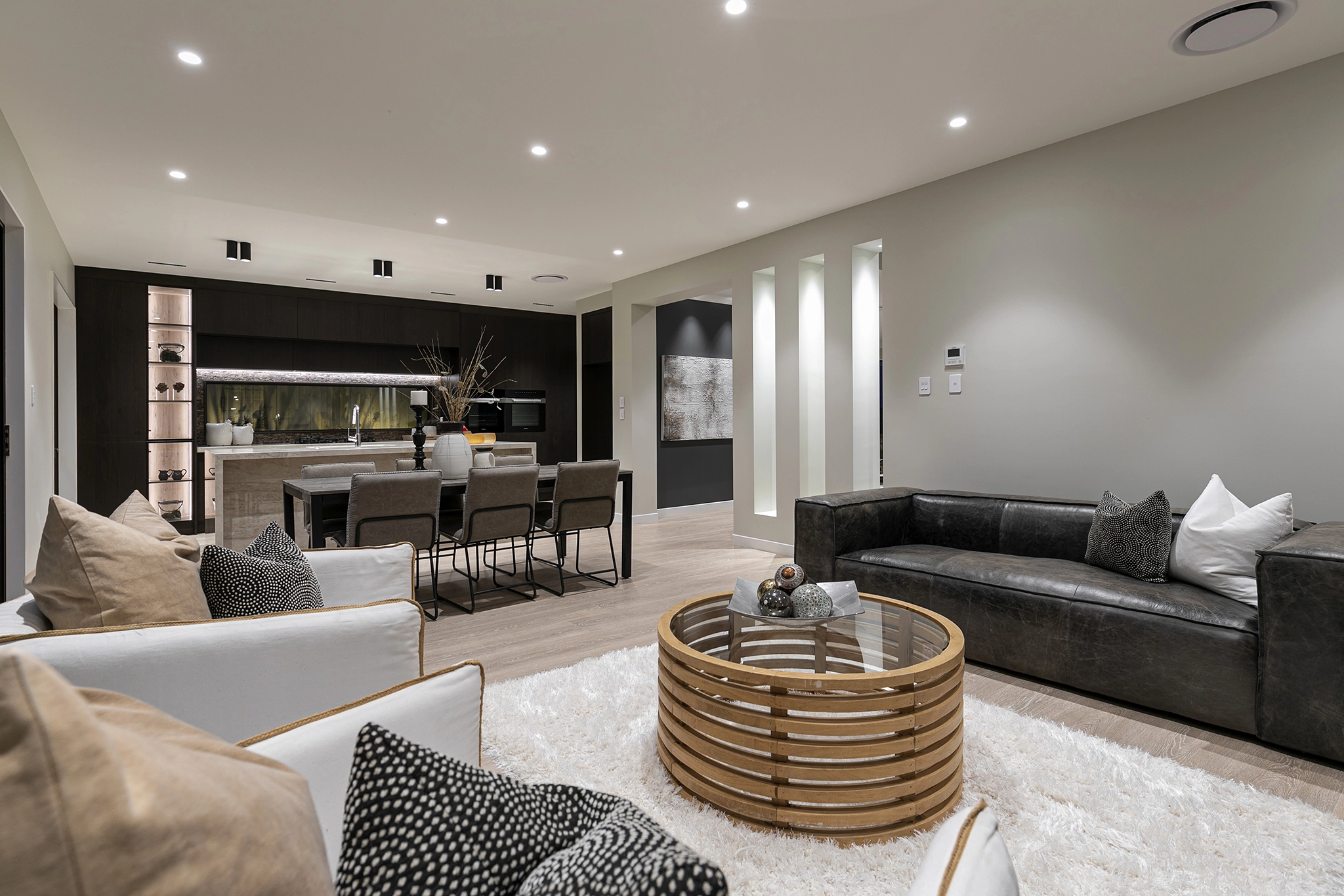 Stardust Walnut dark timber joinery throughout a large Millwater family home with sea views, Pepeke Way