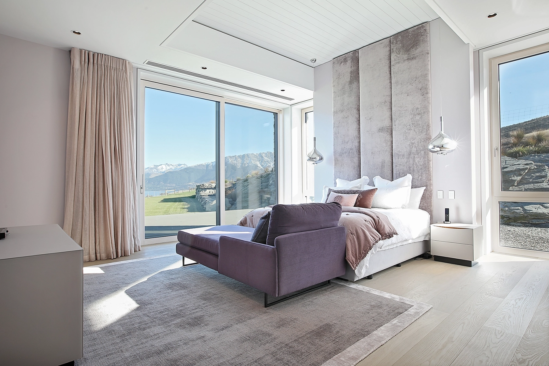 Custom timber interior finishes in a bedroom suite with alpine outlook, Te Toka, Jacks Point