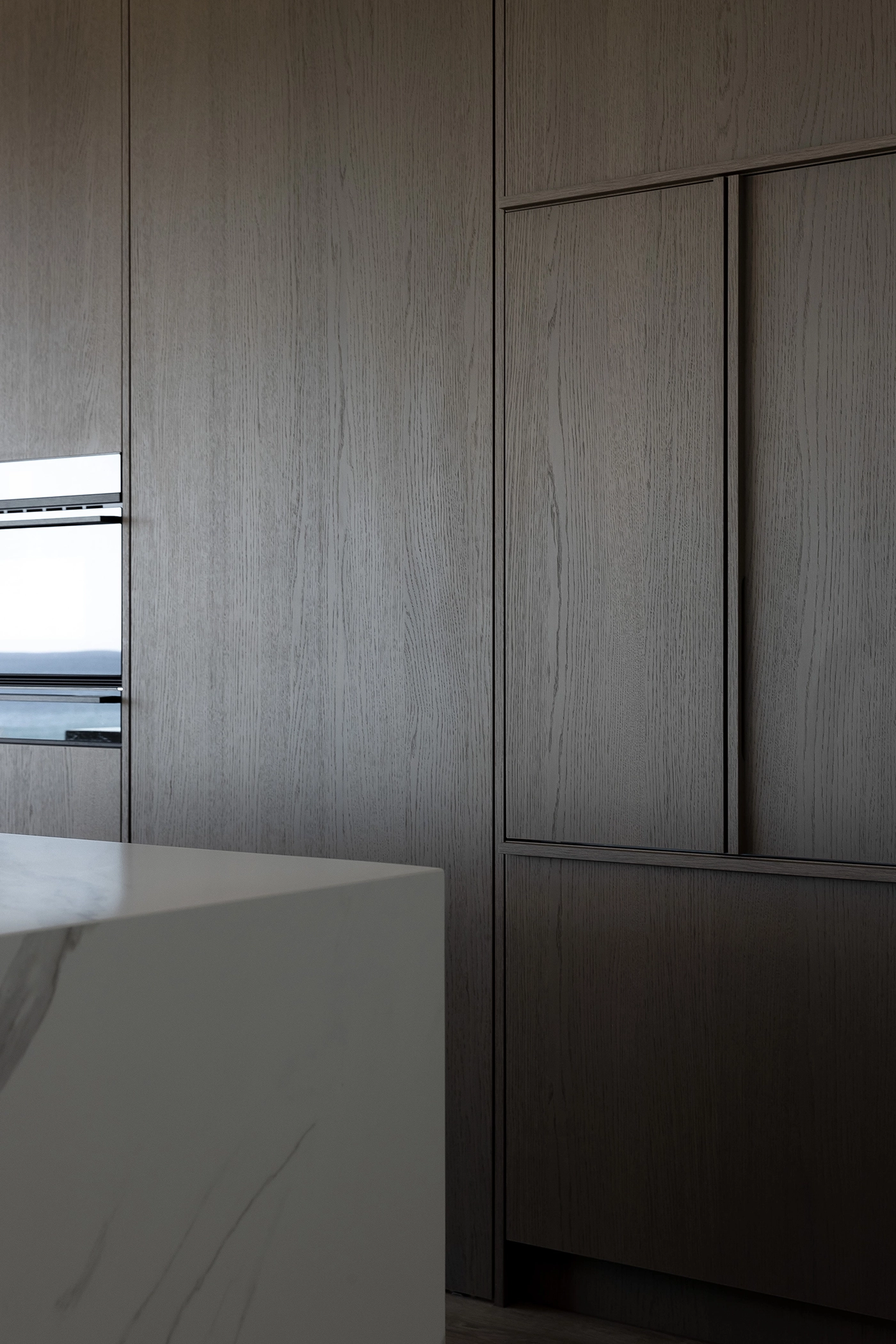 Natural grain prefinished timber veneer NZ panels on kitchen joinery, coastal Oakura, New Plymouth