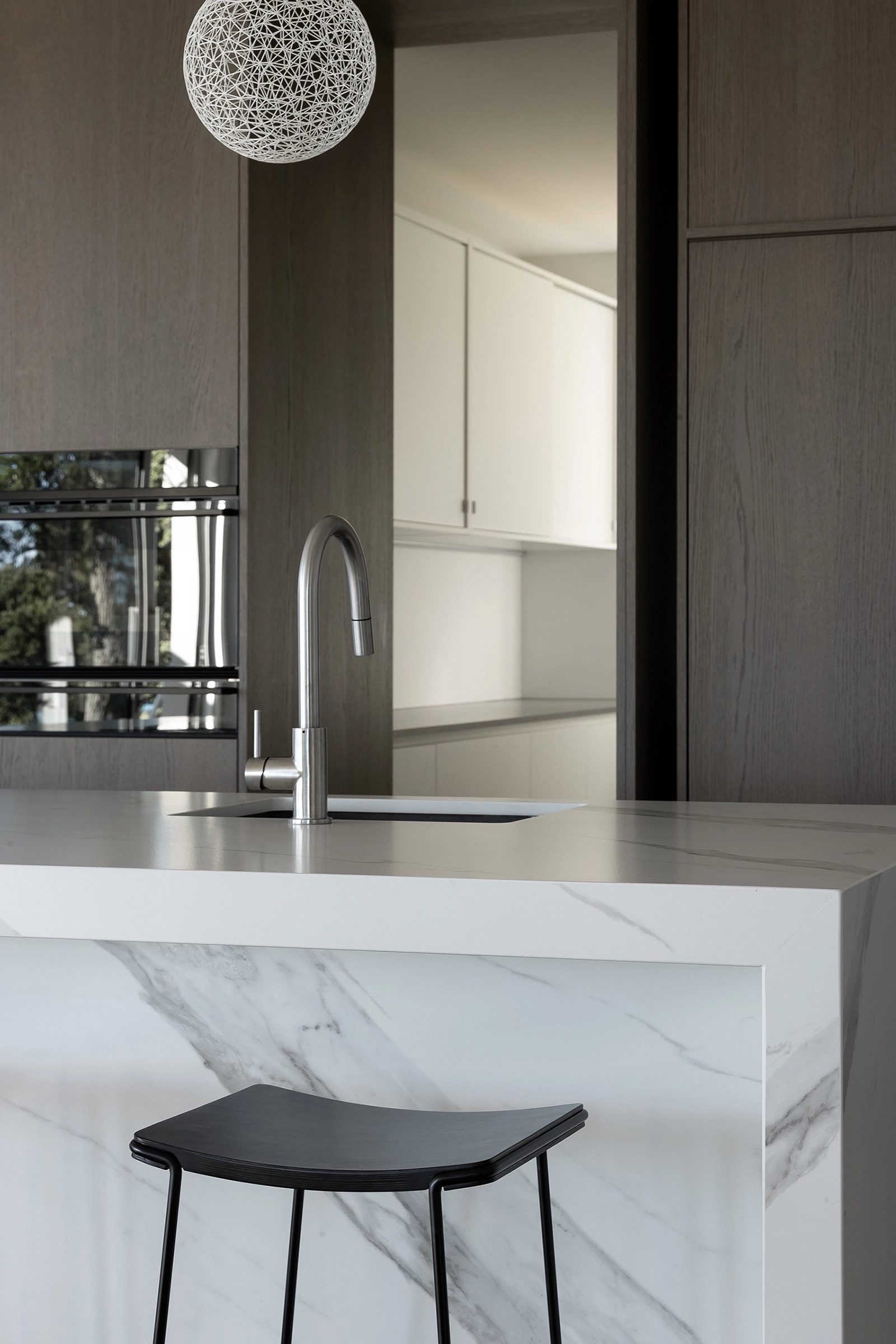 Organic grain detail on prefinished timber veneer NZ cabinetry, Oakura Home, Taranaki