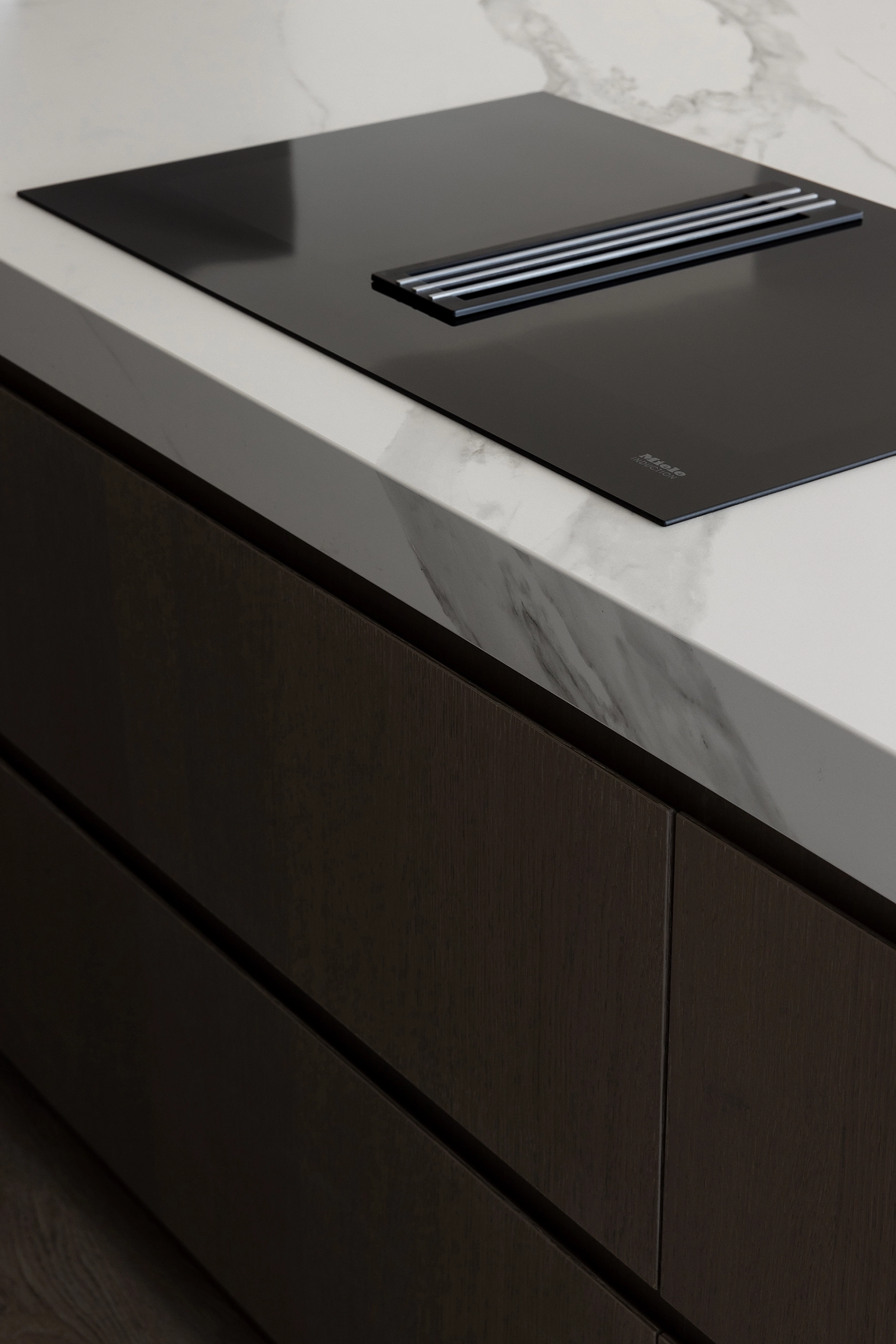 Prefinished timber veneer NZ cabinetry with negative detail handles, Oakura Home, New Plymouth