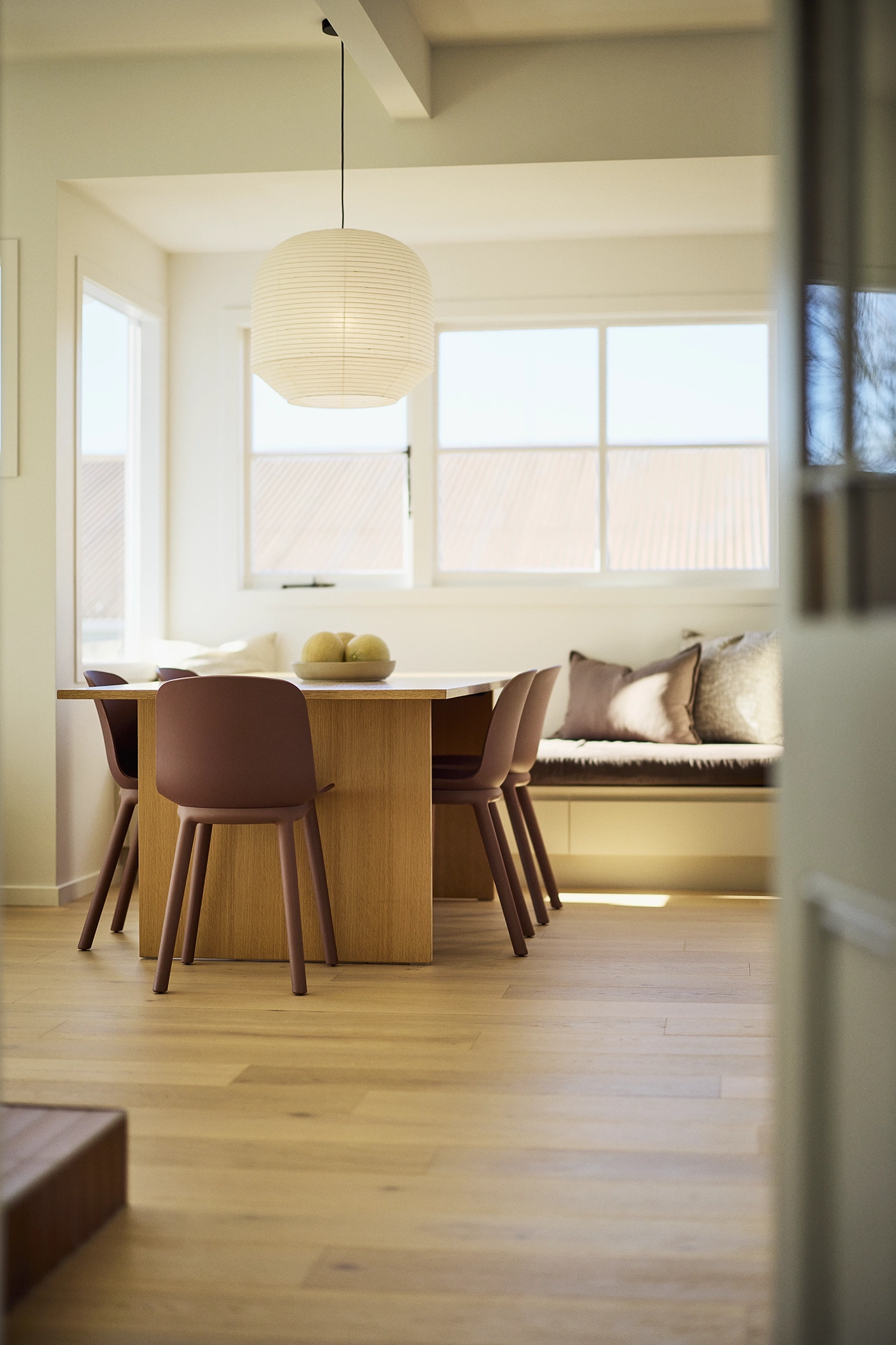 Kova timber flooring NZ flowing continuously through kitchen, dining and living, Rawhiti Residence, New Plymouth