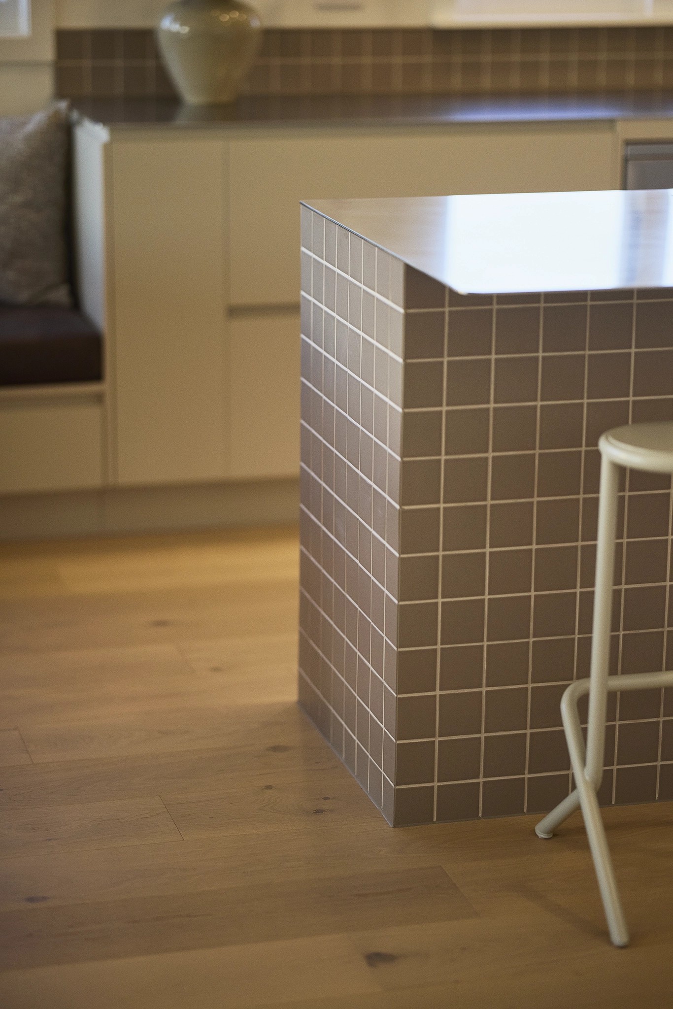Stainless steel bench tops and Rope Surfaces mosaic tile island over Kova timber flooring NZ, New Plymouth