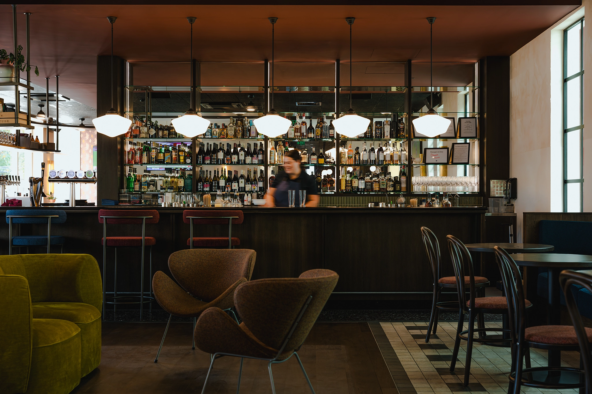Hamilton Hotel private dining room with smoked timber flooring NZ and warm inviting pink tones, Designwell