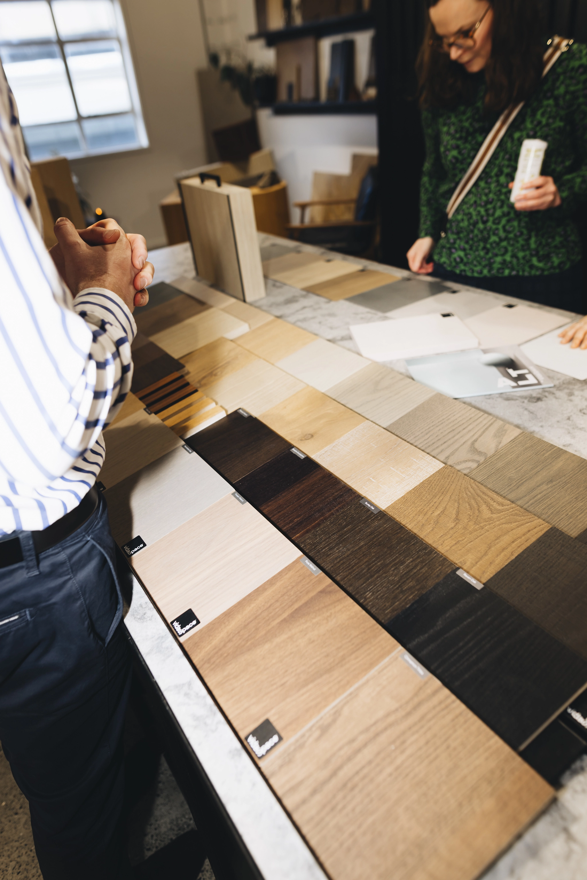 Guests exploring timber flooring displays at Wellington Design Day 2026