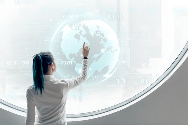 Woman exploring foreign markets on a touch screen device.e