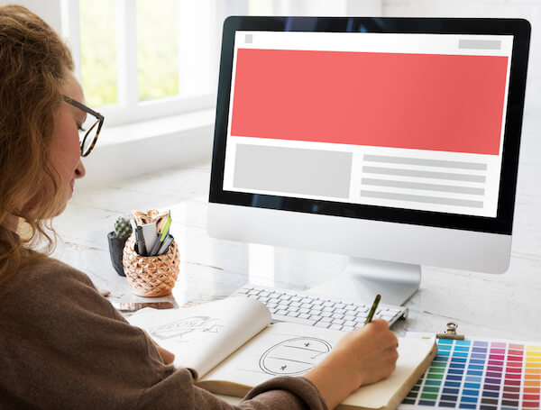 Designer adjusting the design for new audience