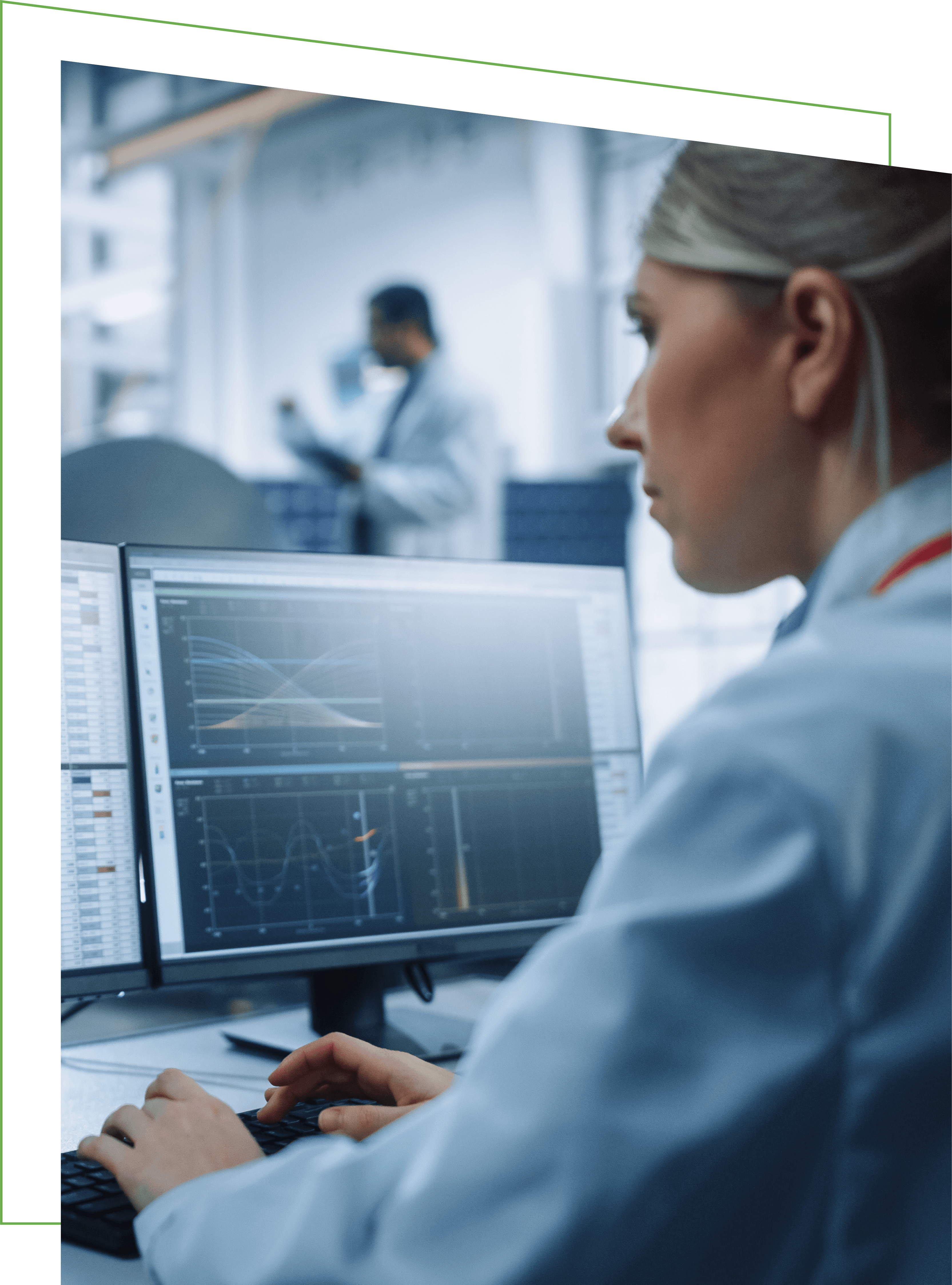 Woman typing on laptop in lab
