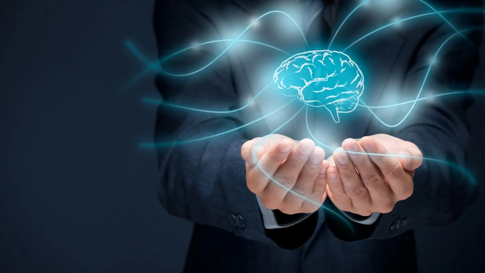 Two hands hold a glowing digital brain icon with connected data lines, illustrating technological expertise, artificial intelligence, and strategic knowledge in IT recruiting.
