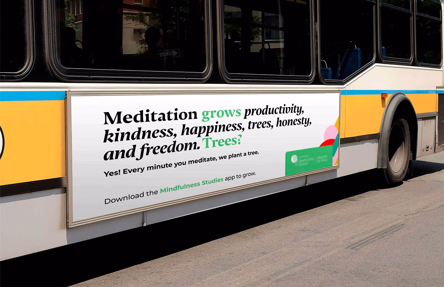 Bus advertisement promoting mindfulness with a message linking meditation to productivity, kindness, and tree planting.