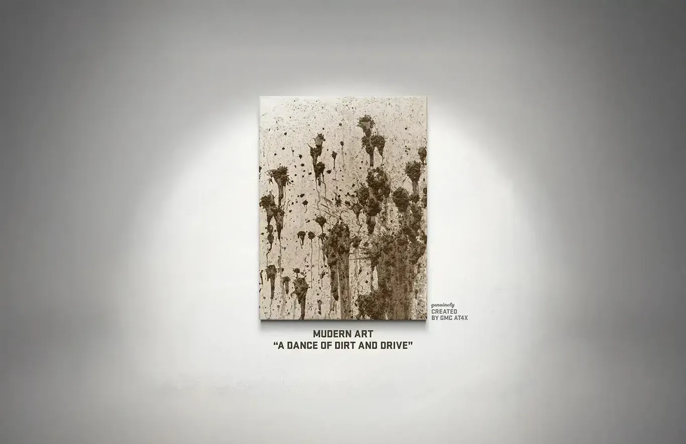 <Полотно 'A Dance of Dirt and Drive' с хаотичными брызгами грязи, созданное проездом GMC AT4X по бездорожью.>