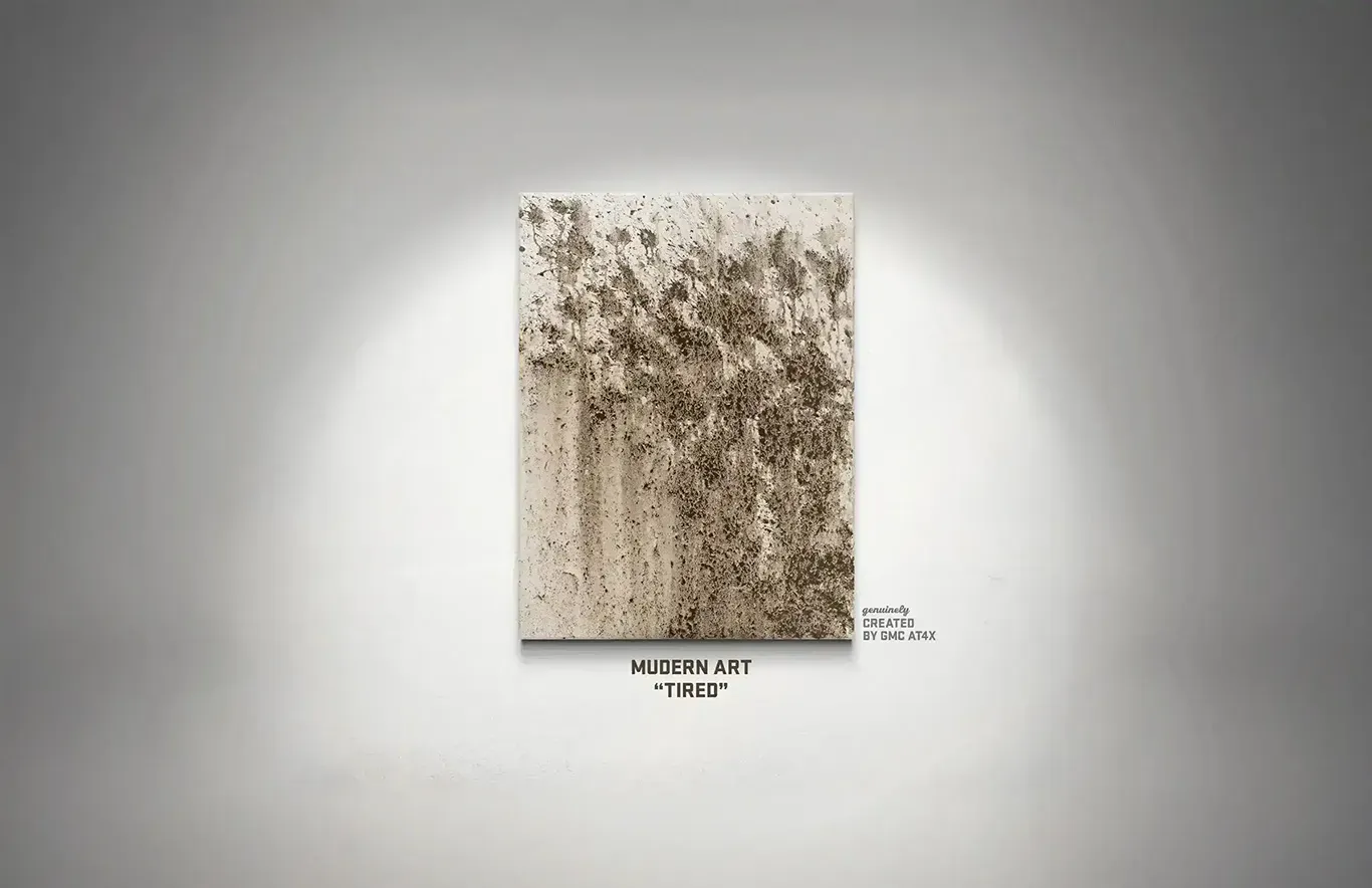 <Mud-drenched canvas artwork titled 'Tired' created by a GMC AT4X vehicle as part of the Mudern Art series.>