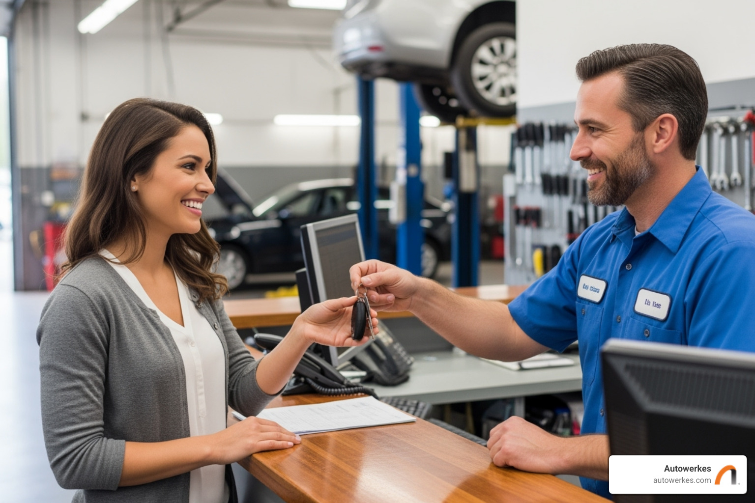 Happy customer receiving keys from an Autowerkes mechanic - Porsche auto repair near me