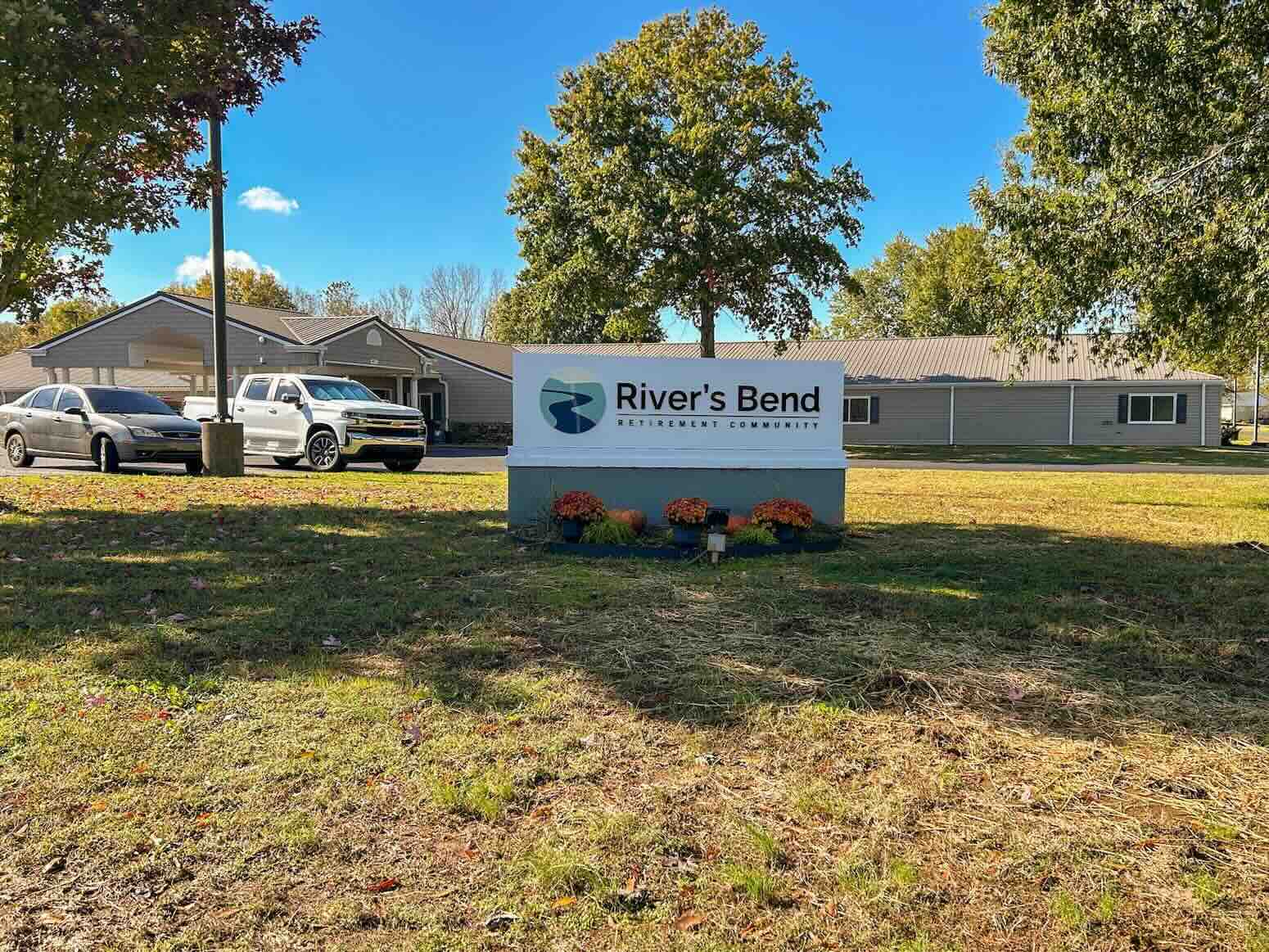 River's Bend outdoor sign with text "River's Bend Retirement Community".