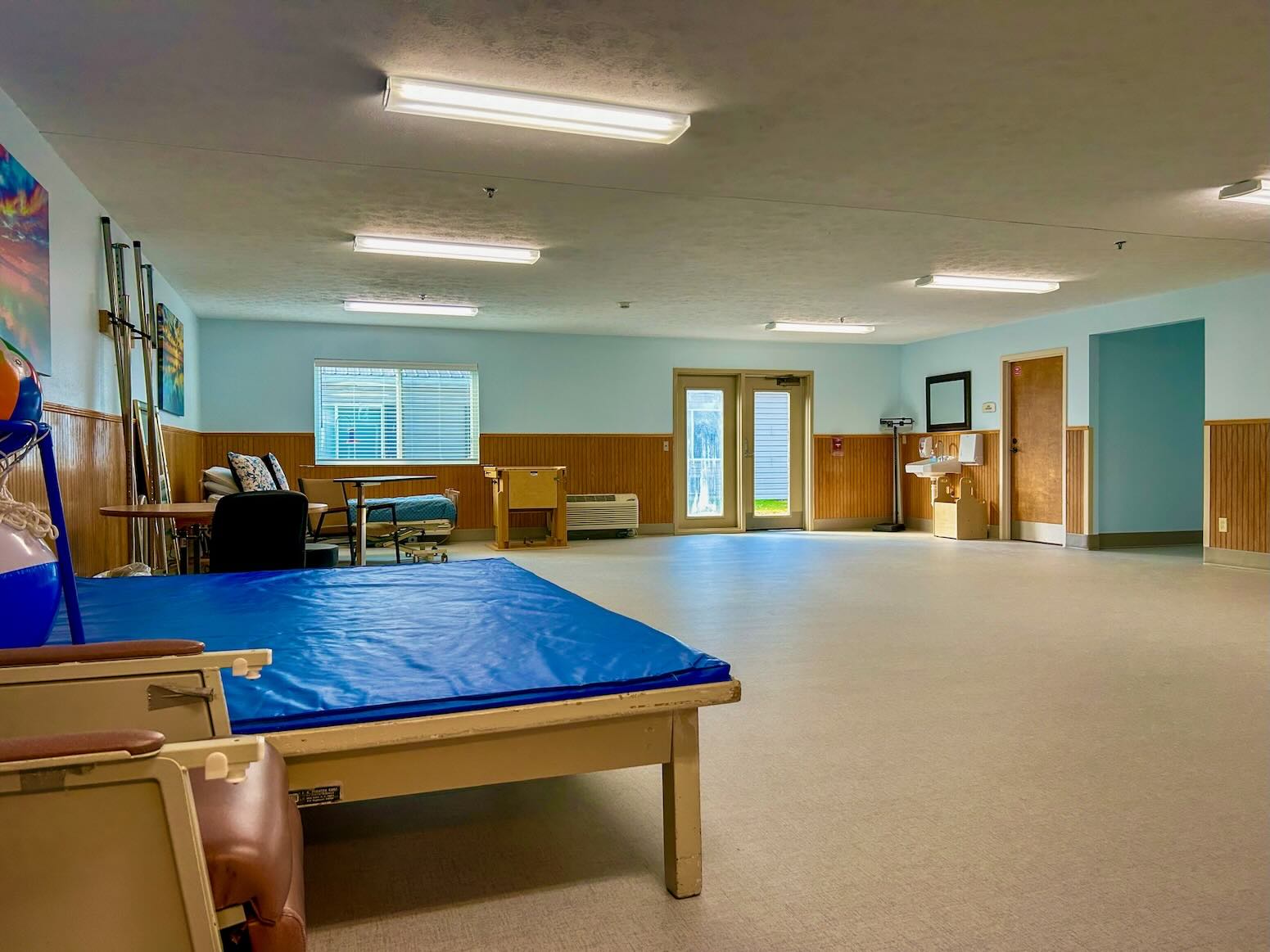 River's Bend Rehabilitation Gym with physical therapy equipment.