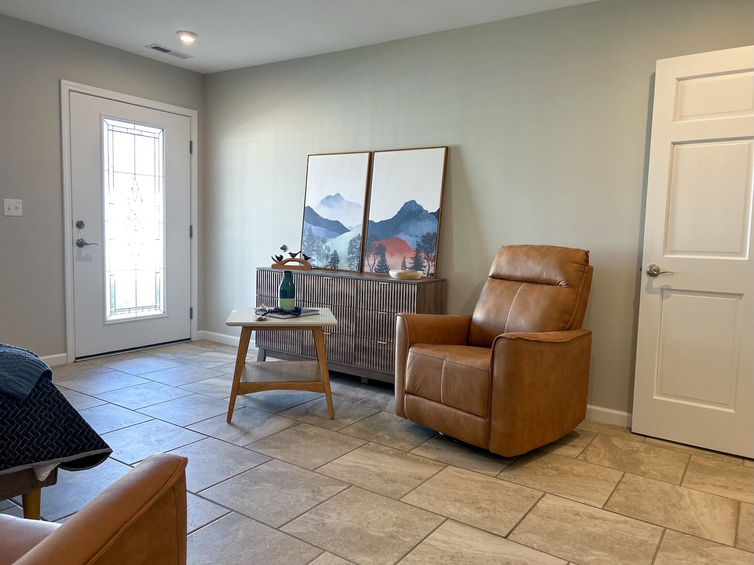 Lake House Assisted Living Apartment with chair and dresser at River's Bend.
