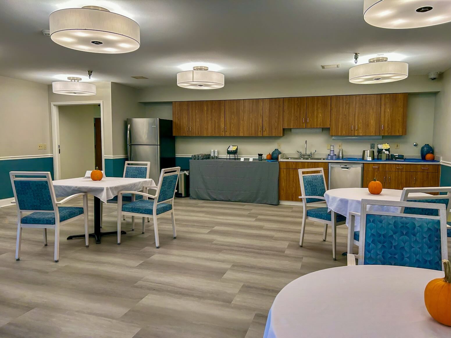 River's Bend Assisted Living Dining Room showing pumpkins on tables.