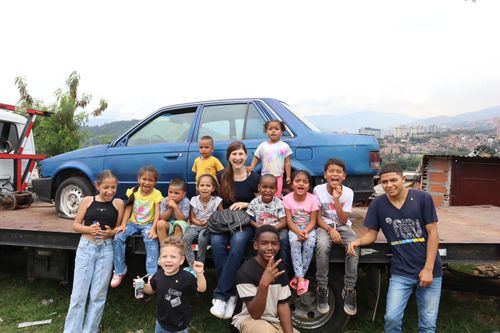 volunteer with children in colombia service leads to purpose
