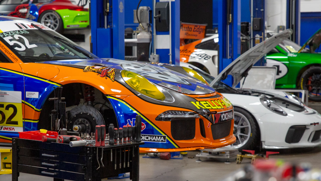 Kellymoss race shop with Porsche race cars