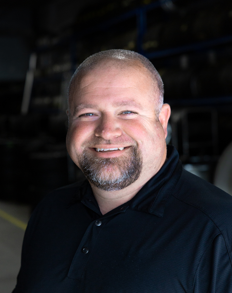Headshot of Andy Kilcoyne smiling