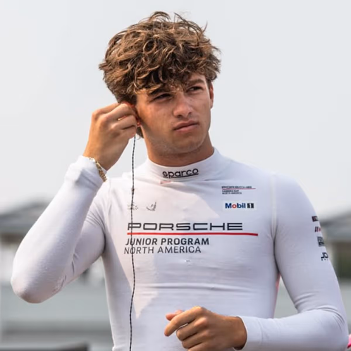 Kellymoss team pro race car driver Alan Metni celebrates a win