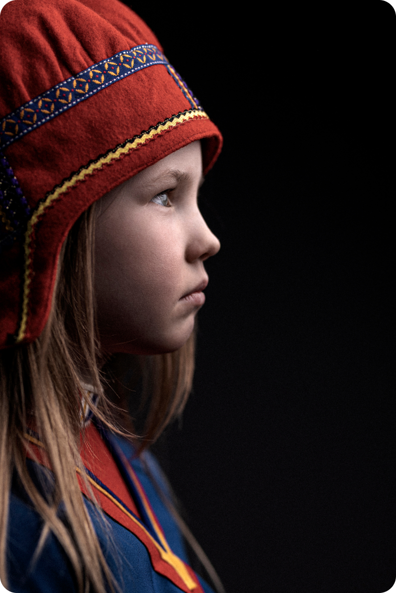 A Sami girl in traditional clothes 