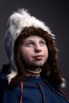 A sami girl in traditional clothes