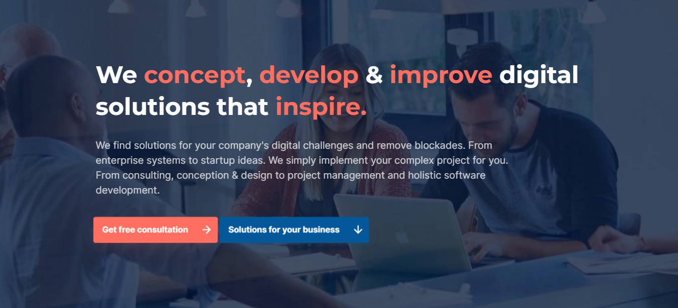 Freshcells consulting group working on laptops, emphasizing their approach to concepting, developing, and improving digital solutions.