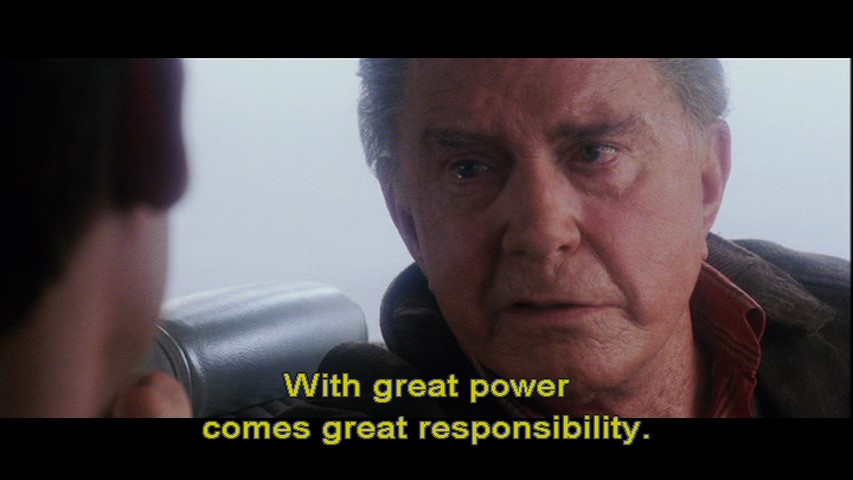 An old man with texts that say, "with great power comes great responsibility."