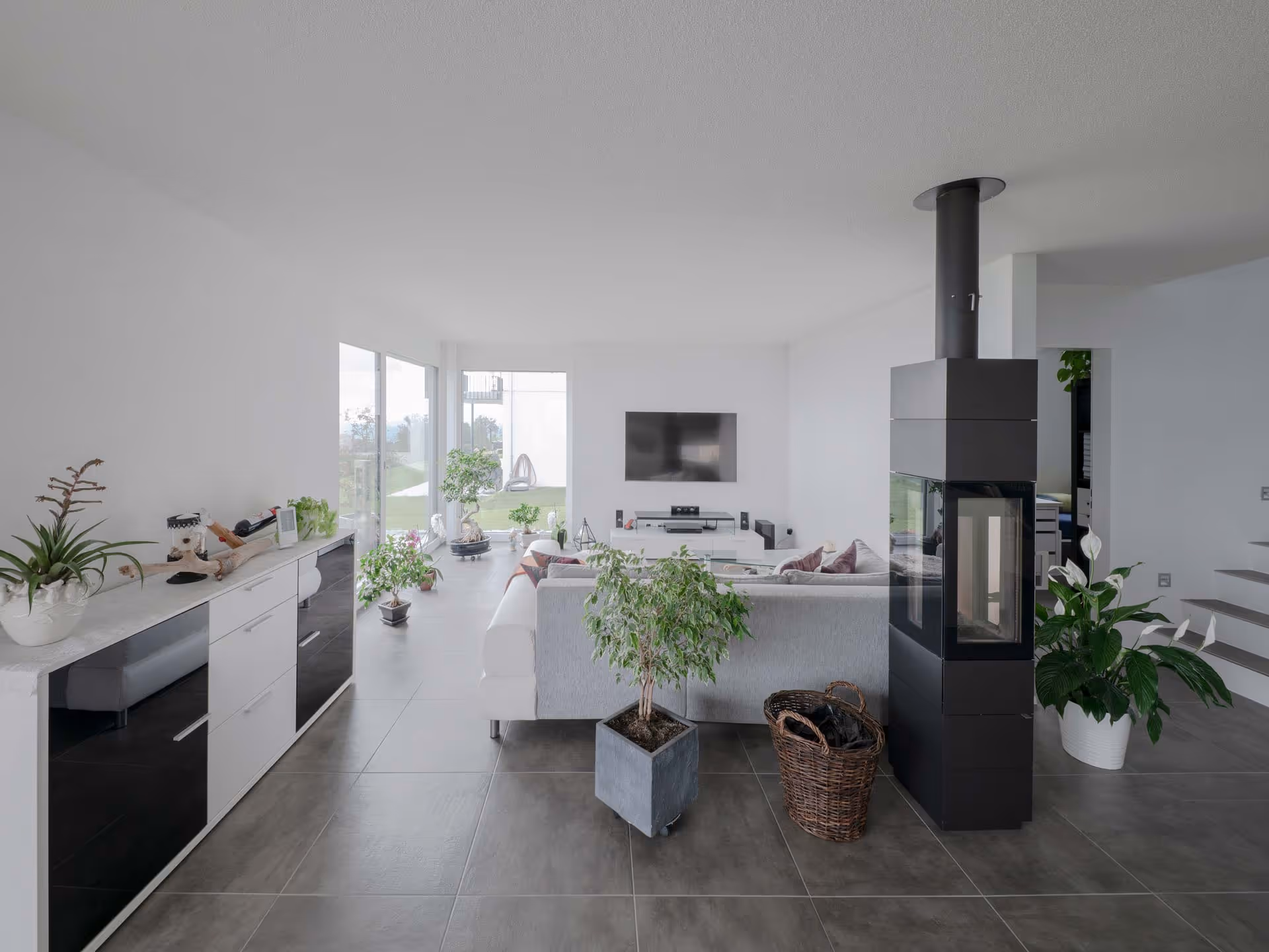 Wohnzimmer mit Cheminéeofen