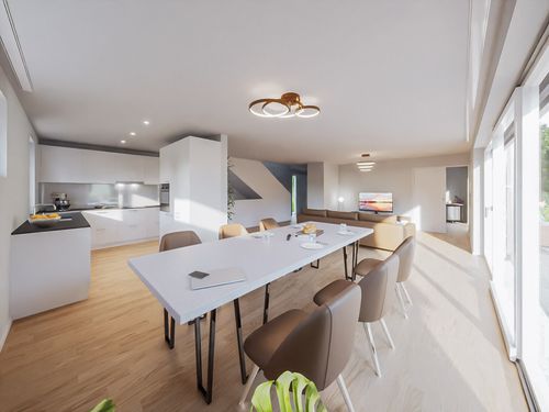 Essbereich mit Blick in die Küche und Wohnbereich