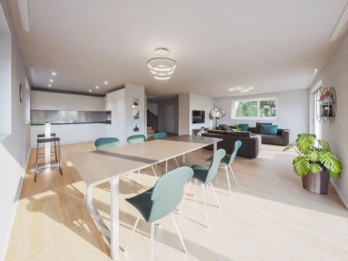 Grosszügiger Essbereich mit Blick in die Küche und Wohnzimmer