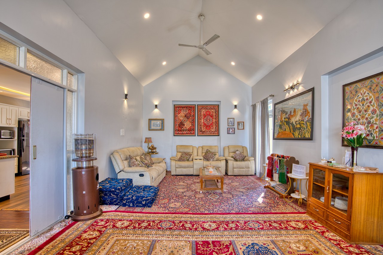 Original furnished living room before furniture removal