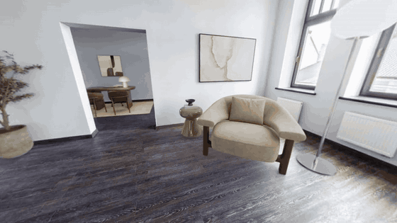 The same 360 degree tour after Apply Design staged the room with a double bed, two bedside tables, a lamp and framed art