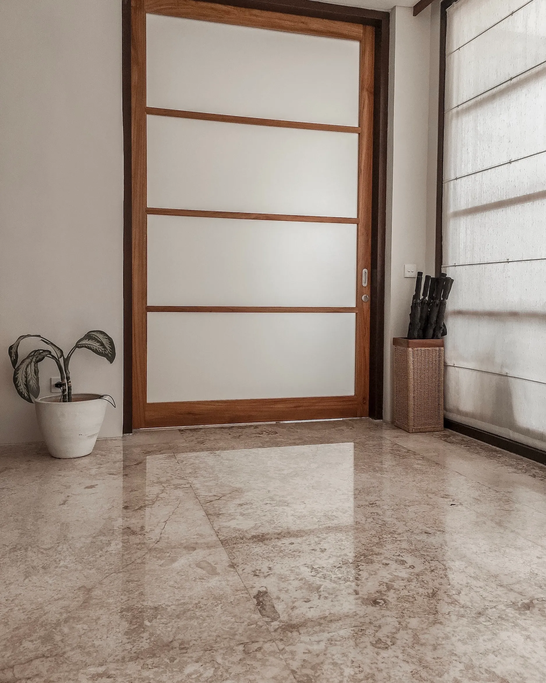 small room with marble / tile flooring