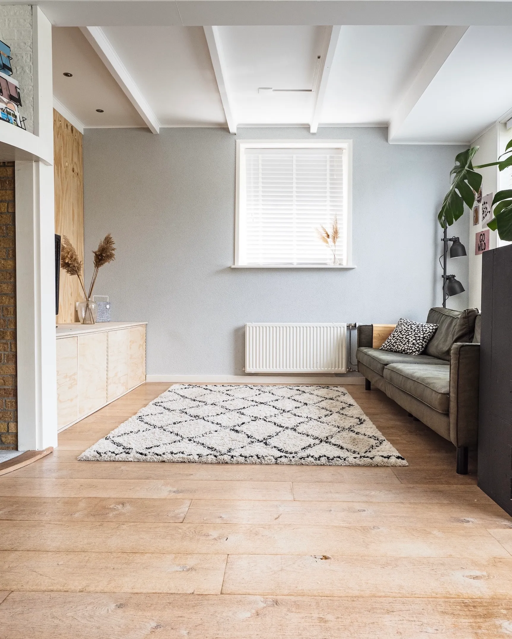 Room with furniture and carpets
