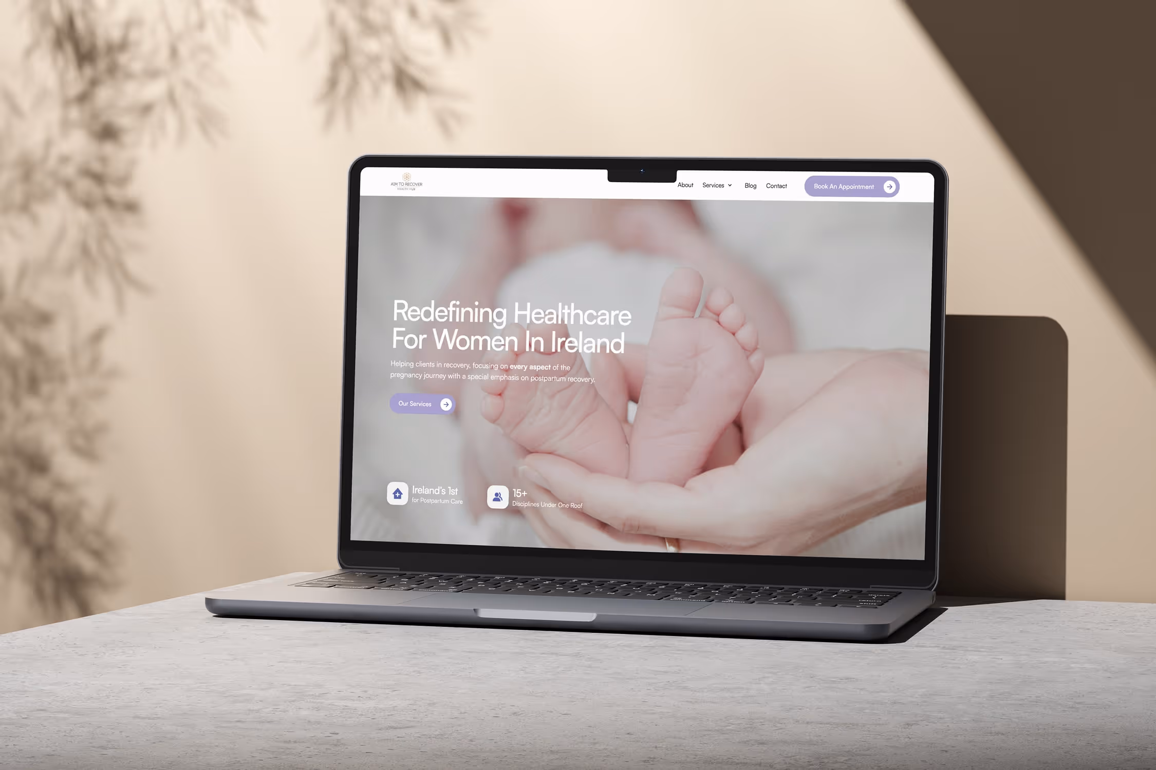 Aim To Recover website mockup on laptop