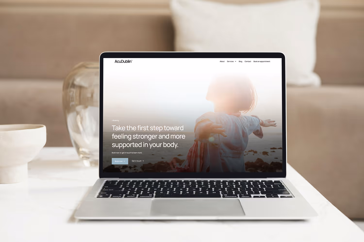 Macbook mockup of AcuDublin website