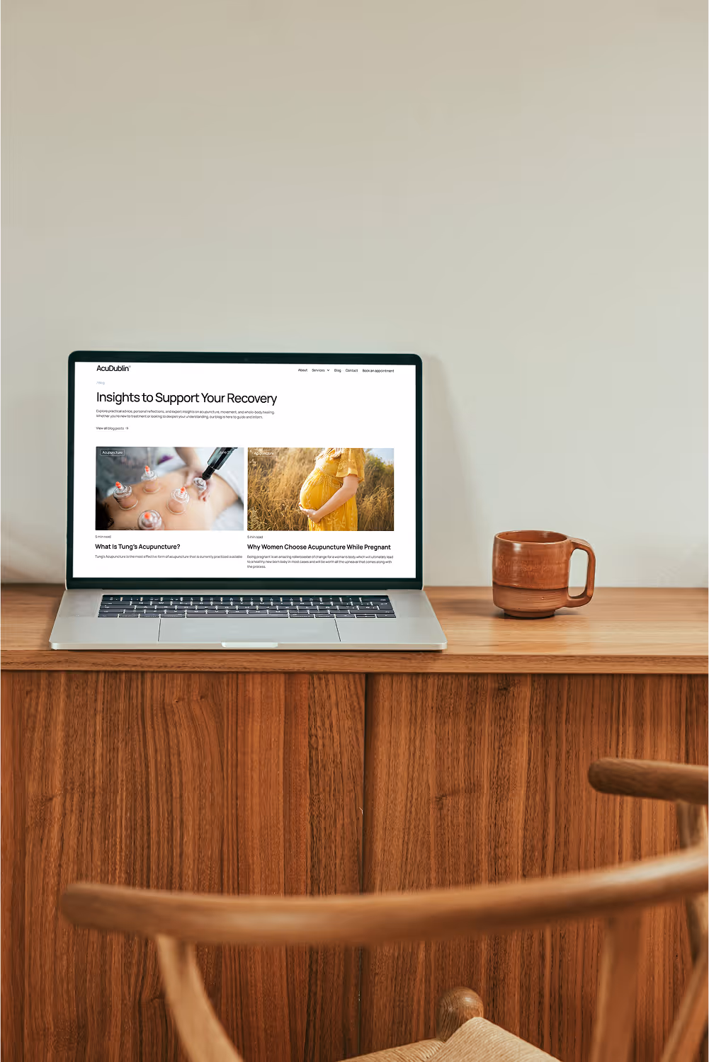 Macbook mockup of AcuDublin website