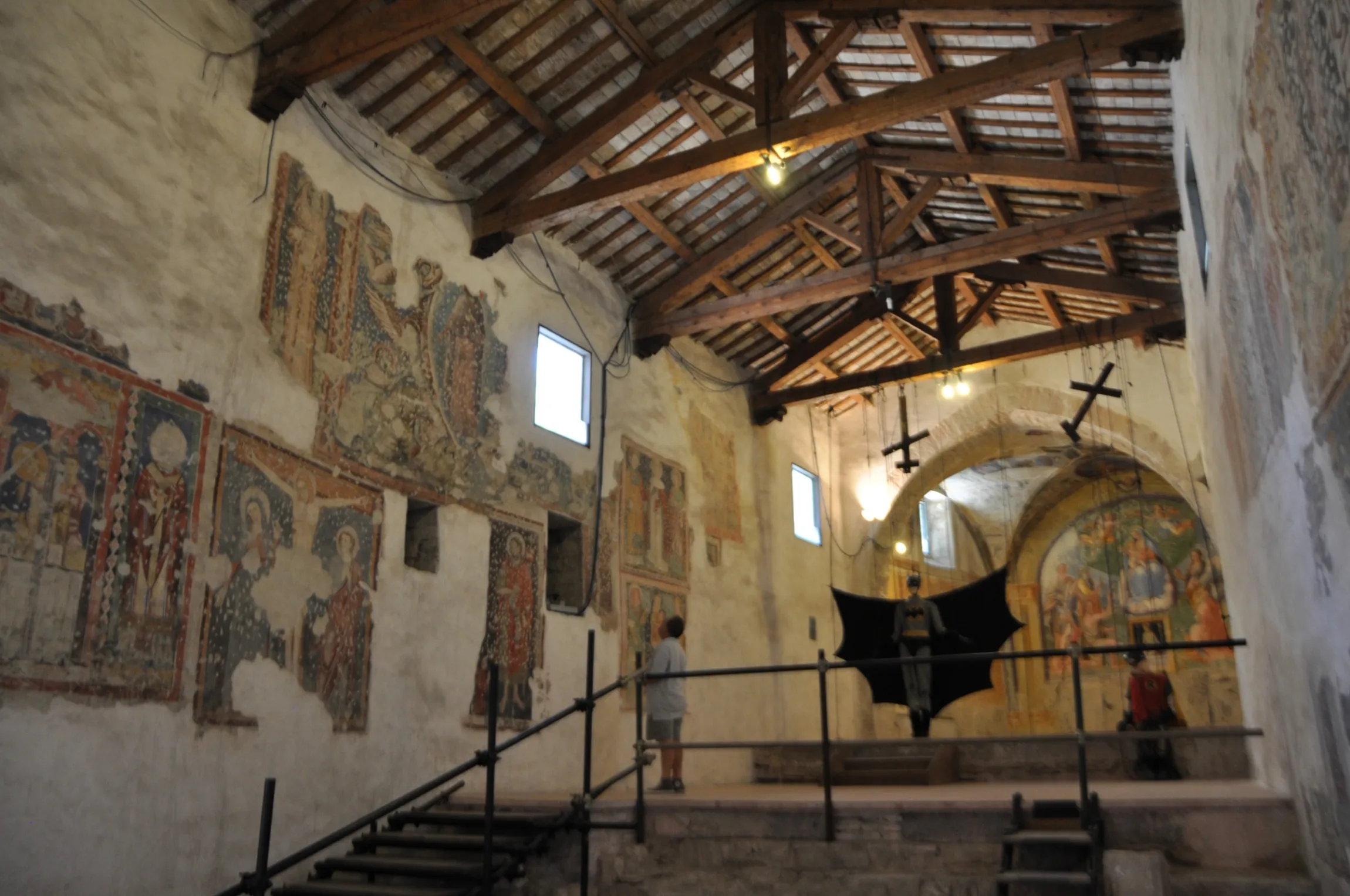 An art event (with Batman) inside the medieval Church of San Giovanni e Paolo in Spoleto, Italy (Photo Lyle Goldberg, 2012)